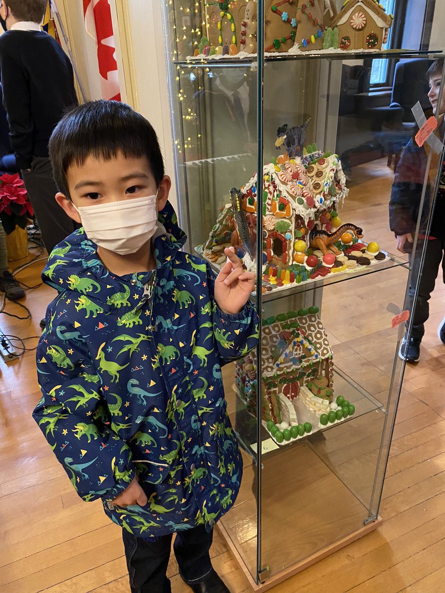 We had our gingerbread raffle today!  So many big winners, like Juno who won the highly coveted House #13.  And checkout Justin, our dinosaur-clad kindergartener who won the dinosaur house! All proceeds went to the Hamper Drive - thanks to boys and teachers for playing along! 🦖