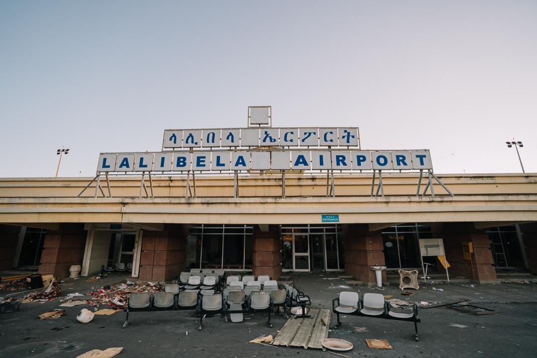 MFAEthiopia's tweet photo. The terrorist Tplf proved that it is public enemy number 1. Here are samples of health institutions, public buses, hotels, airports &amp; banks that are destroyed by the group in Amhara region. What’s that got to do with ‘protecting’ Tigray? https://t.co/X2kQWgafnE