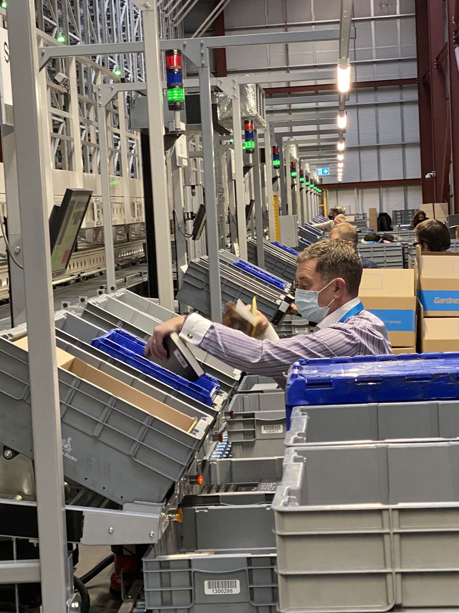 Nigel_Wyman's tweet photo. #pickingandpacking @Gardners but this time with some of my fellow directors. David Cole ops director and Jonathan little owner and MD. Itβs all hands on deck to get those books to all our customers ππ» https://t.co/Aeg2zB8pwJ