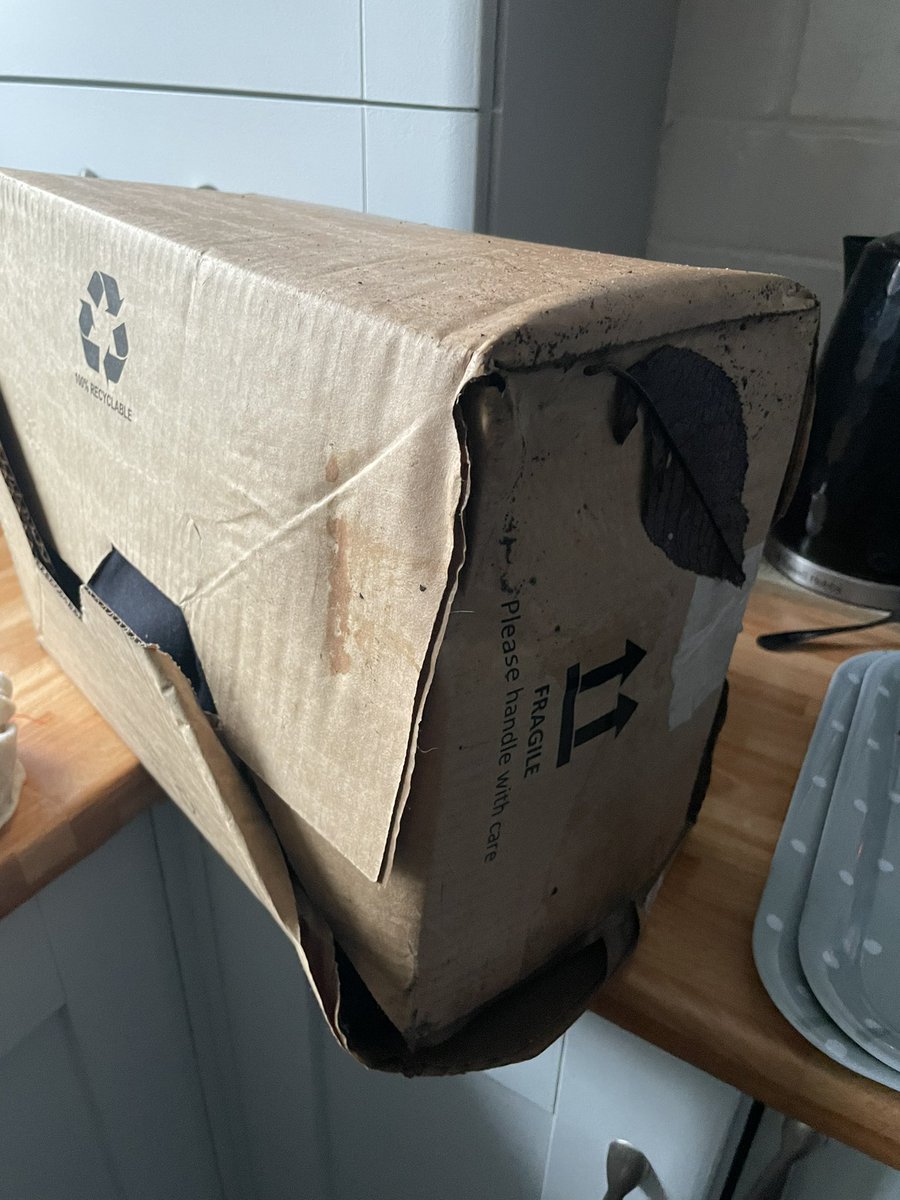 bownie92's tweet photo. Absolute shambles @Hermesparcels and @zavvi imagine not packaging parcels safely and then dumping them behind a bin with no note given and it raining? I’m top of waiting almost a month @zavvi_cs  and CEO contacted. https://t.co/OBsDFUKX42