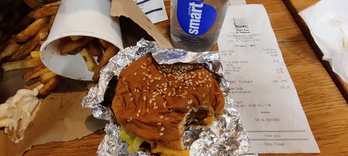 Tommoxon's tweet photo. @FiveGuysUK thought I'd mention, something odd going on a Coventry street, ordered a little burger, small Cajun fries and a btl water, but was charged for a bacon cheese burger, medium fries and soda. Only realised when my order was missed and I went up to check. https://t.co/auEAPTL9Qg