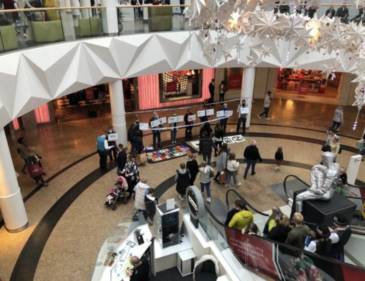 XRShef's tweet photo. This protests targets greenwashing techniques and exploitive capitalistic systems rather than individual shoppers. 

Come join us and say hello if you’re nearby!
#Meadowhall #Meadowhell #Greenwashing #CorporateGreed https://t.co/0vsxZygDeH