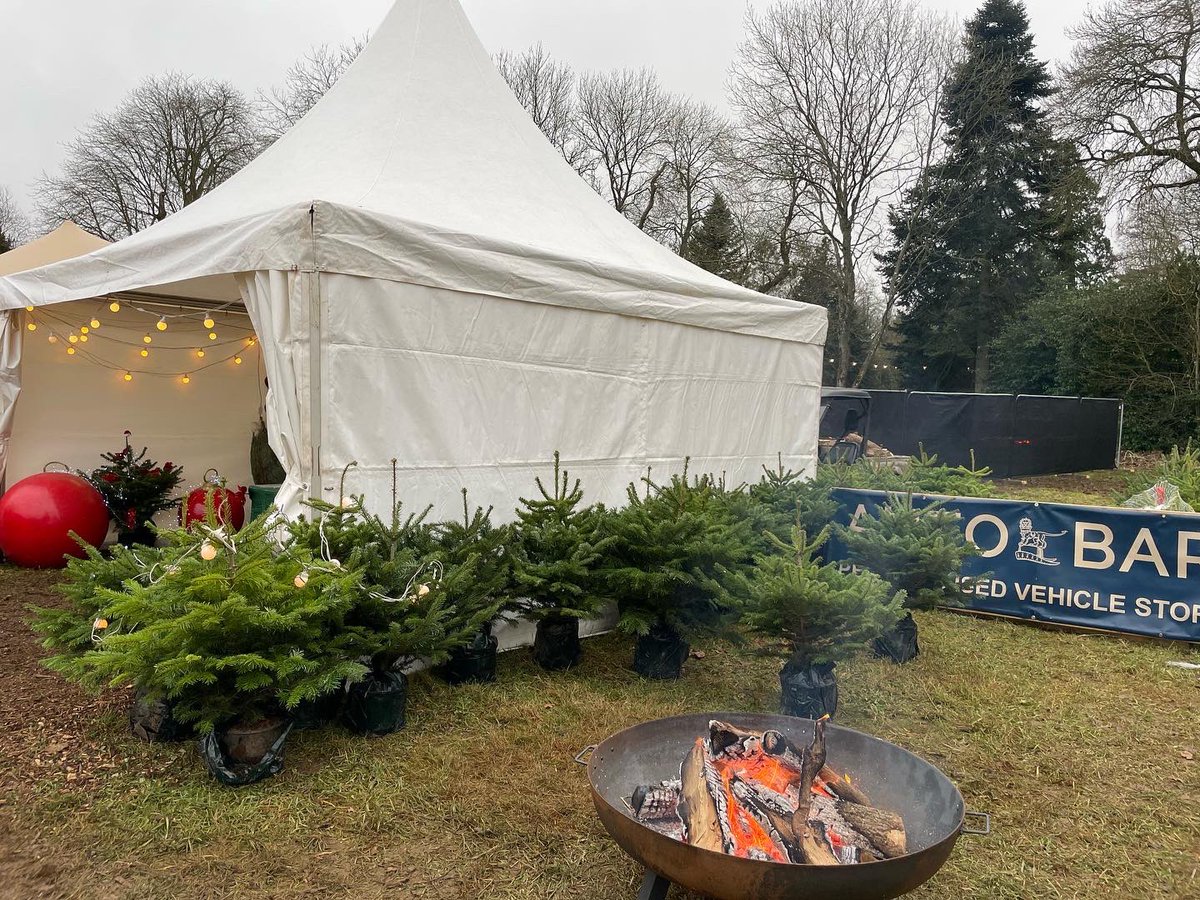 Lots of people enjoying our fire-pit whilst picking their Charlton Park Christmas tree. @Countryfilelive Christmas in the Park