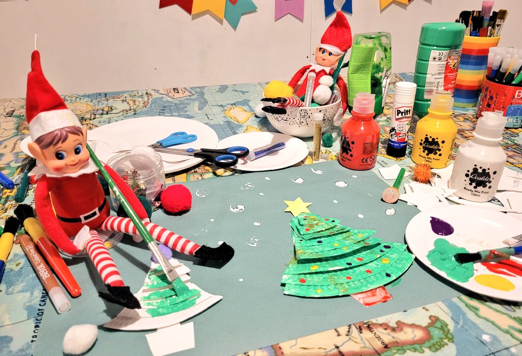 Running2staysa1's tweet photo. The elves have found paint and glitter, yay! with thanks @DarrellWakelam for the paper plate Xmas tree idea for our #elfactivities . Not so artistic but the elves are tired & I have a 6am alarm to get up & run before going to be run director at junior parkrun. #crafts #elves https://t.co/c5PRgV3l5R