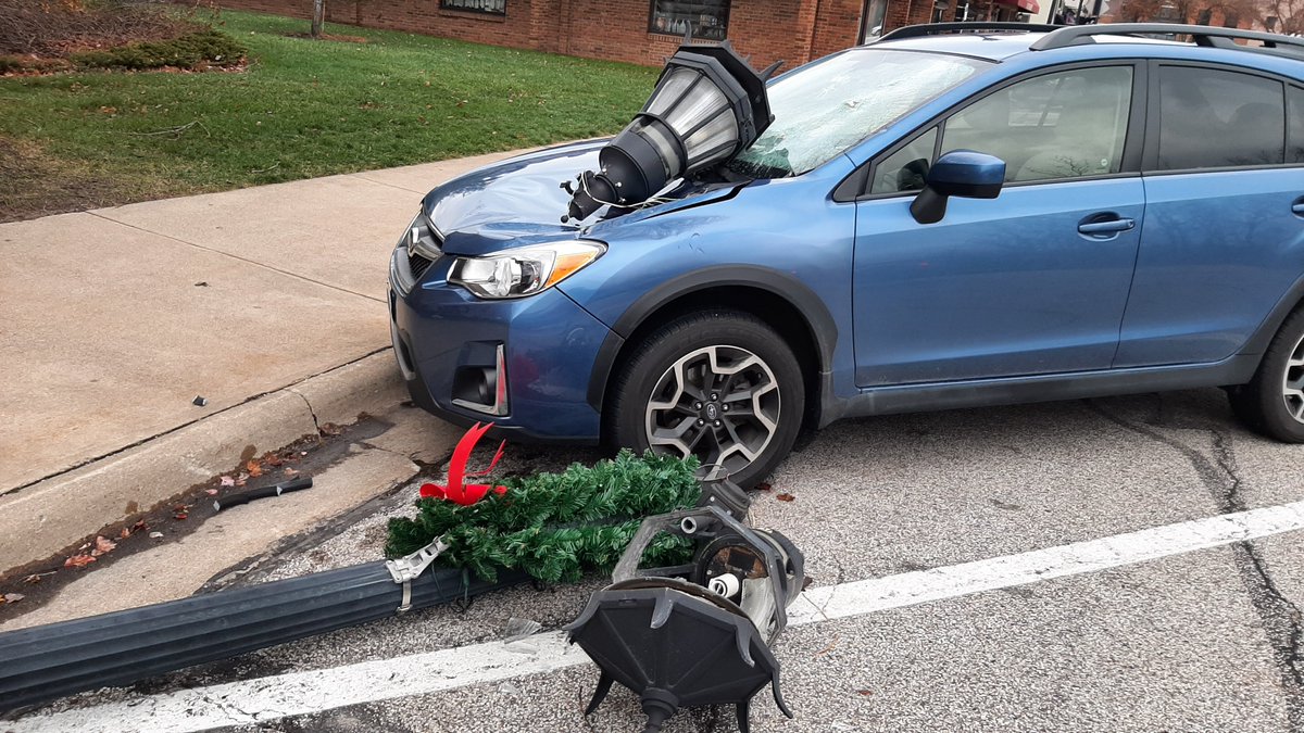 TMFox51's tweet photo. @NWSCLE ... Not sure if this is of interest to you.  This is a picture of my parked vehicle damaged by a falling street light pole.  (No injuries, thankfully) Location is Front Street in Berea in front of the Baldwin Wallace Music Conservatory.  Approximate time was 3:00PM. https://t.co/GBrW1IshJm