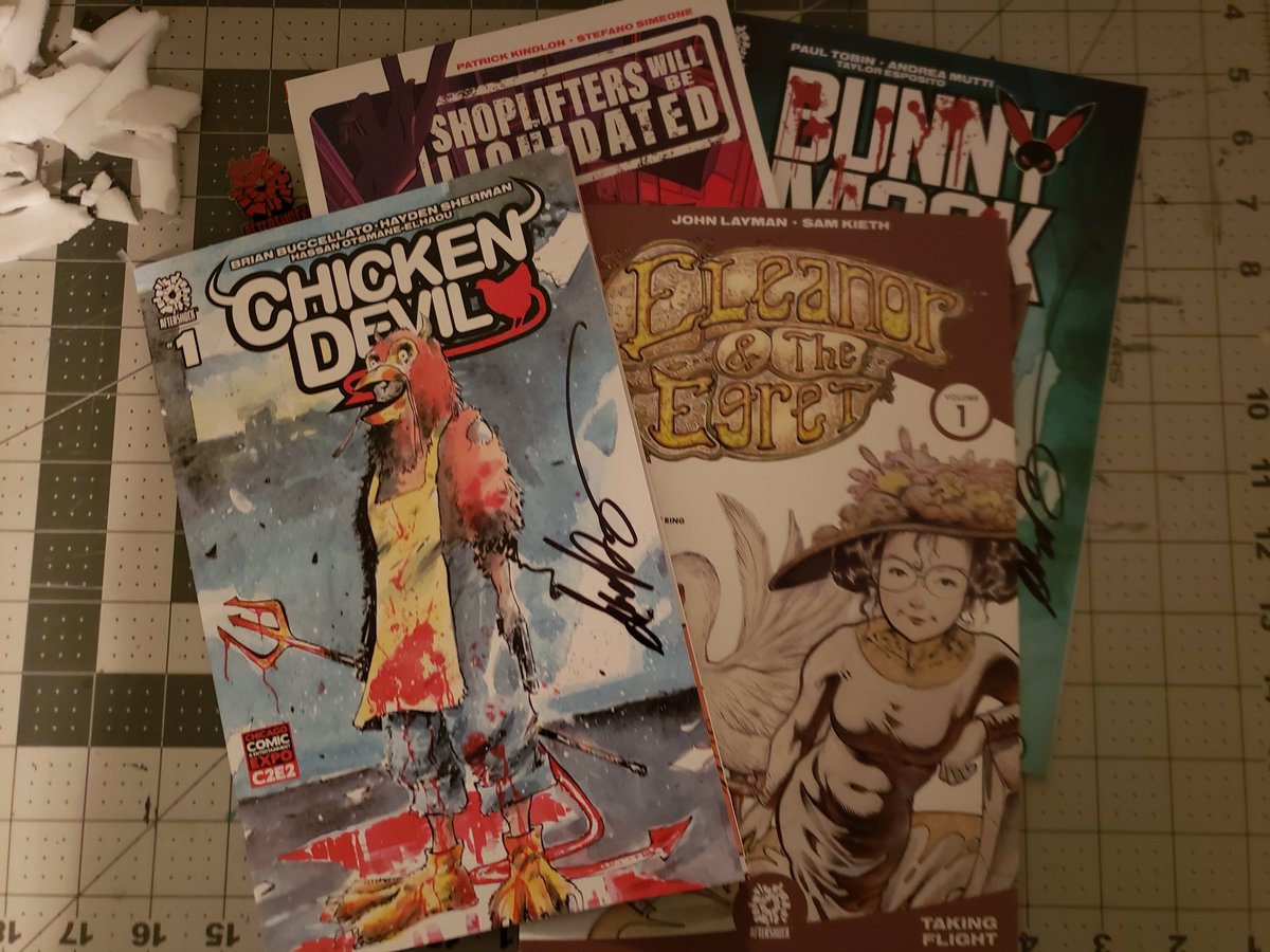katiemarcumpro's tweet photo. I did spoil myself a bit at the @AfterShockComix booth (big surprise, I know) with some great recs from @ru_thompson! ❤ The highlight buy was definitely the con exclusive #ChickenDevil variant tho-- and @andreamutti9 was cool enough to sign it (and a copy of Bunny Mask) for me! https://t.co/CjBkuAxDe1