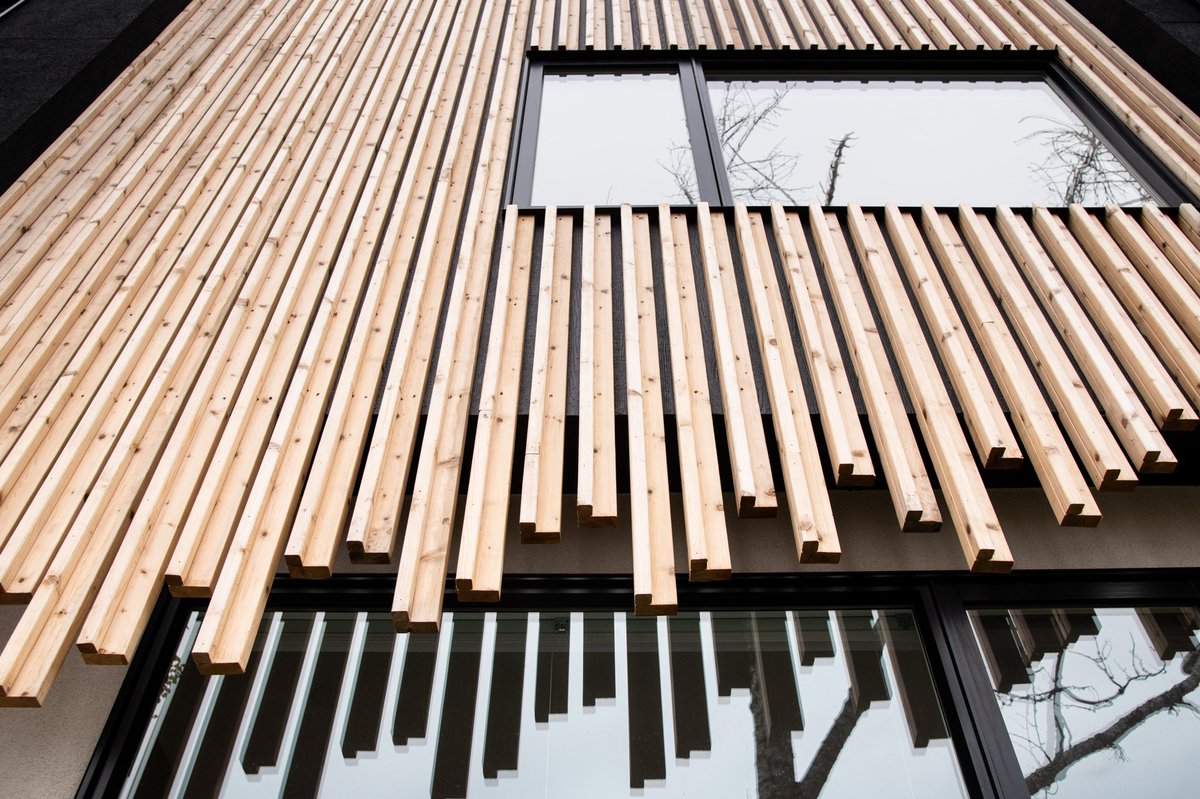 Another solution to bring four homes on a less conventional footprint. 43x141 feet. Taking advantage of the depth on a lot that would have been two very deep semi-detached infills into four row-houses. Cedar💧 detail 🔥. #rowhouses #yyc #missingmiddle