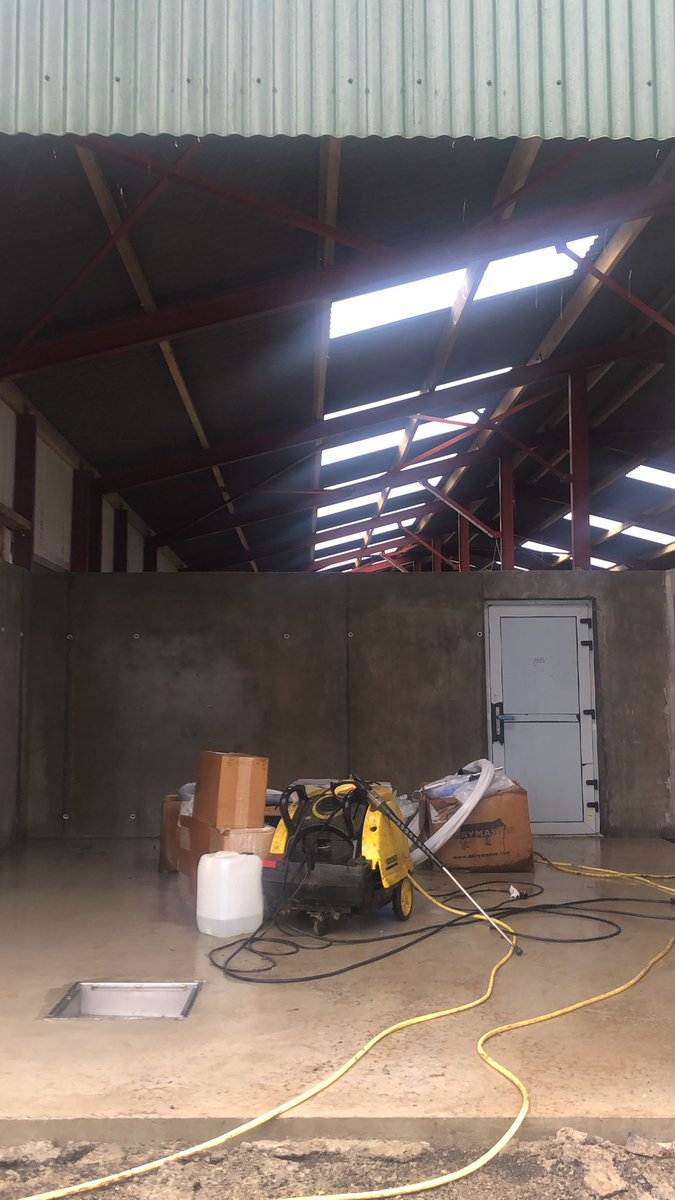 Need to block area between dairy and milking parlour so my dairy is sealed. I would like to keep the height in the dairy . What are my options? Roller door going in front of bulk tank. Are the alternatives to pvc sheets with a timber stud?
