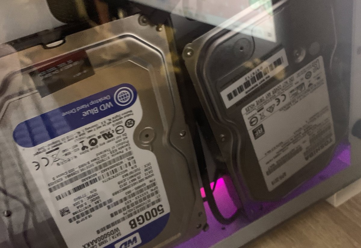 abigailsian's tweet photo. replaced a harddrive in my pc by myself … technical genius. however, couldn’t figure out how to get the old one out so it looks like this for the foreseeable https://t.co/nRlAD3rM1v