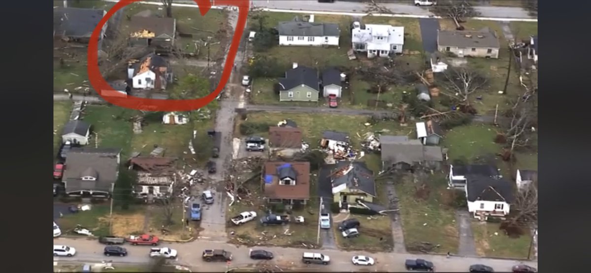 ColeClaybourn's tweet image. Aerial footage from my neighborhood. The green house in the top left in the red circle is ours. Just so much devastation around us.