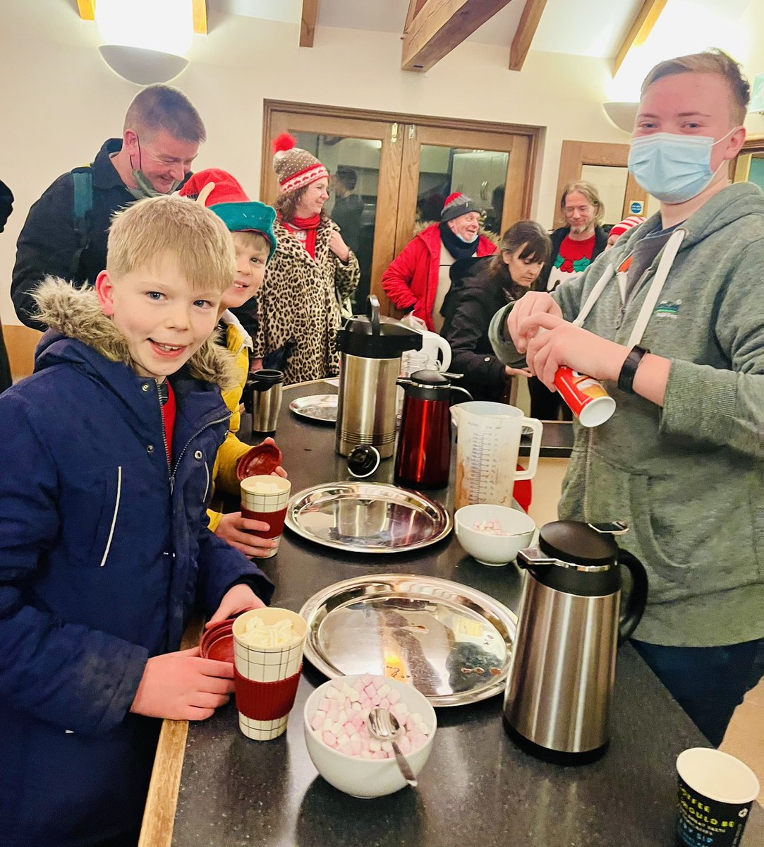 CAROLS IN THE CHURCHYARD 
Nearly 90 of us sang carols in the rain last night with mulled wine, hot chocolate &amp; mince pies afterwards -
we are looking forward to doing the same next year! Thanks to all who came! Carols by candlelight next Sunday at 6pm (inside &amp; without the rain!)