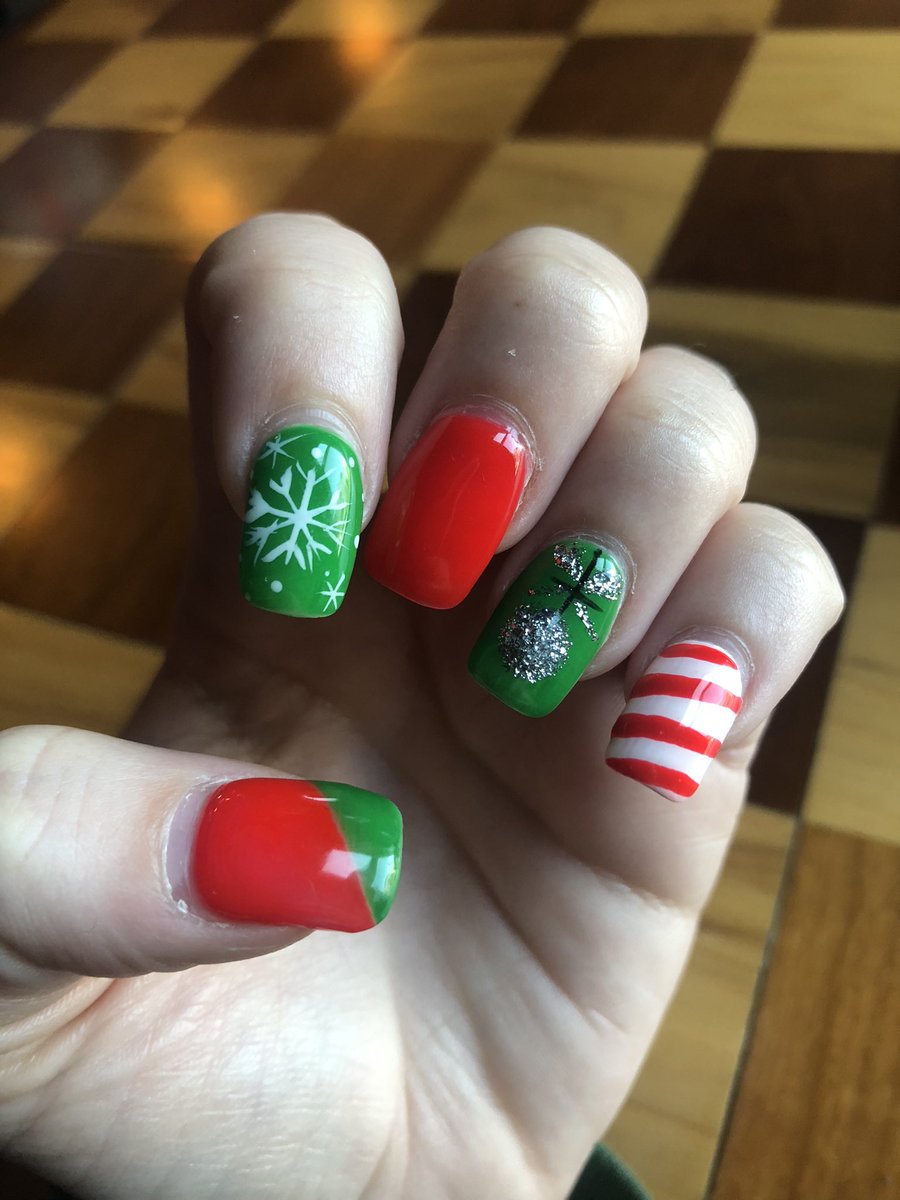 brizzybri's tweet photo. They are grown out now, but my students designed Christmas nails for me! https://t.co/tKknQqE3iR