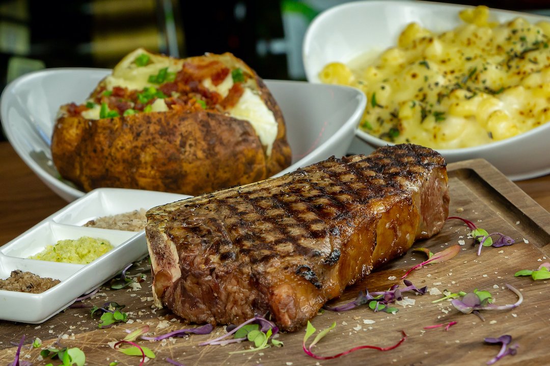 BourbonBonesAZ's tweet photo. Our 22oz. Prime Dry-Aged New York Strip is the kind of dish you deserve this holiday. Come in and try it for yourself. 

#BourbonandBones #ArizonaRestaurant #ArizonaFoodie #ArizonaSteakhouse #Chophouse https://t.co/JTYkYa09Cv