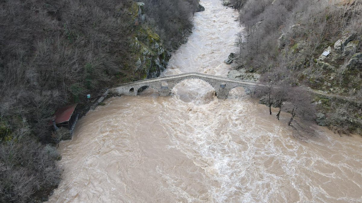The Devil's bridge in the Rodopa mountains withstanding yet another river inflow. It was constructed 500 years ago by a local Bulgarian stonemason on the orders of sultan Selim I. It's called Devils for it was believed that only the Devil could have inspired its durability.