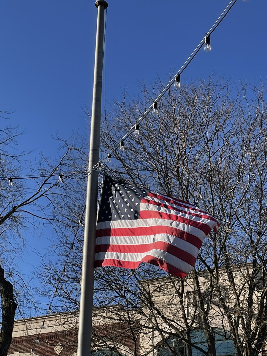 Flag at half mast. “You are never going to get over it, but you will never get through it . . . . Let our voices rise and speak out against gun violence.” - Pastor J. Jackson