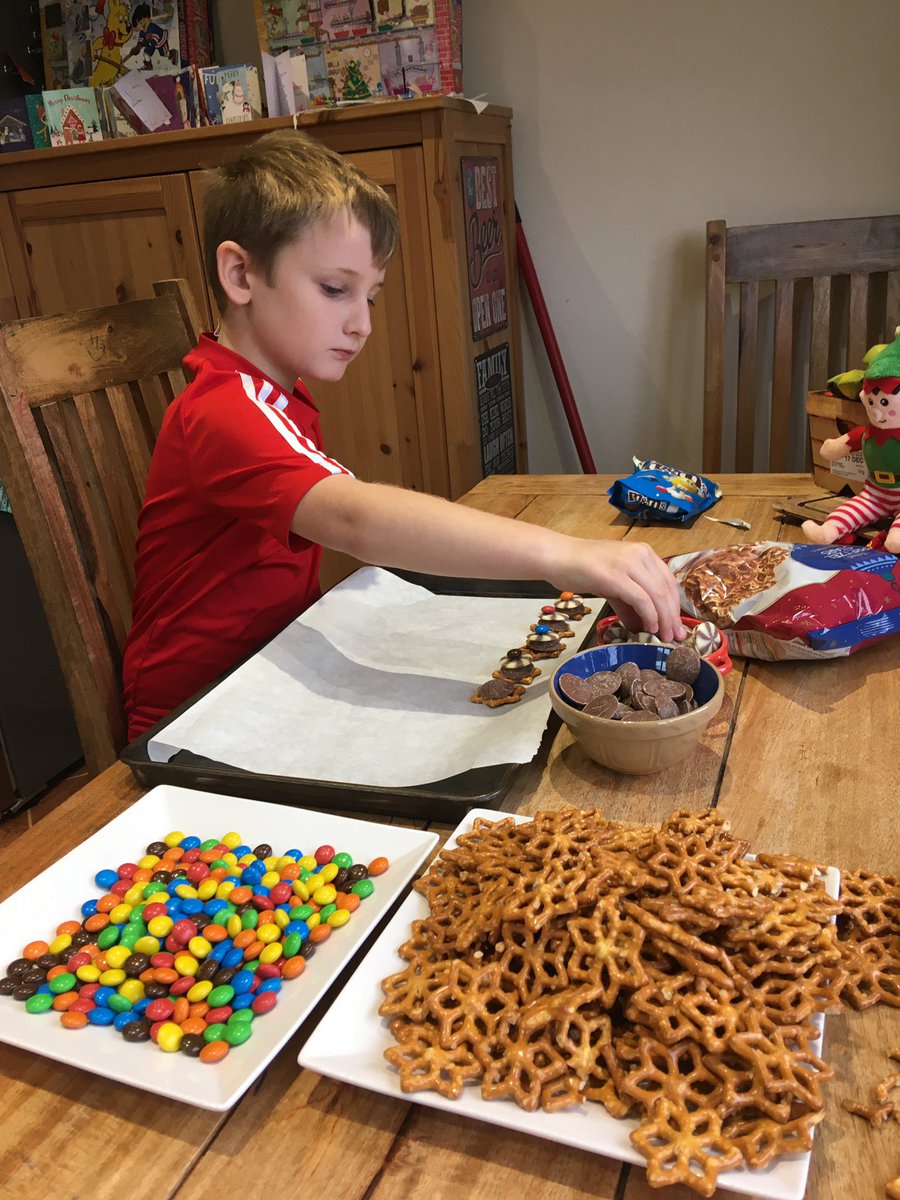 Starrrboook's tweet photo. Christopher concentrating very hard on his Christmas baking for his school topic @OPAK_3SF @SarahRoberts82 (they’re delicious btw 😋) https://t.co/59bXSTjh3a
