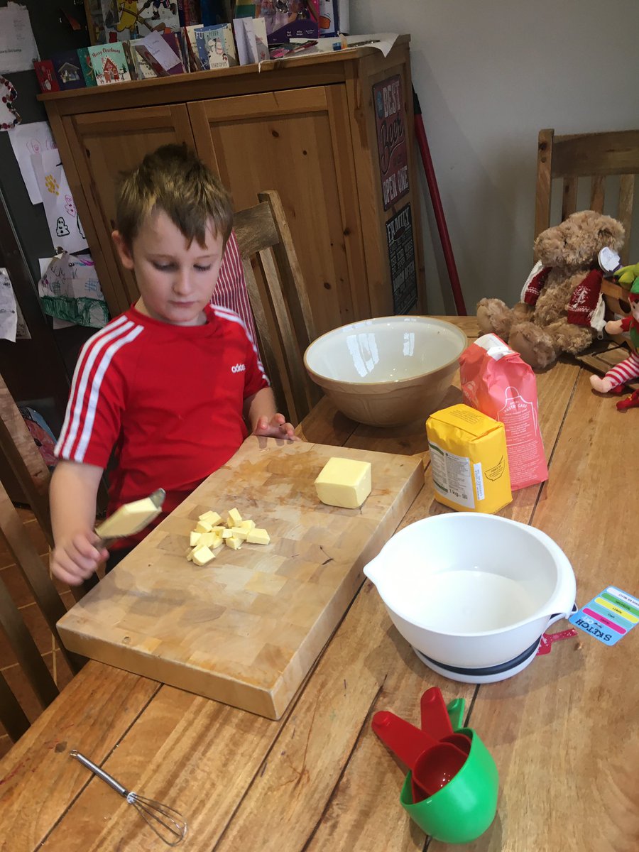 Starrrboook's tweet photo. Christopher concentrating very hard on his Christmas baking for his school topic @OPAK_3SF @SarahRoberts82 (they’re delicious btw 😋) https://t.co/59bXSTjh3a