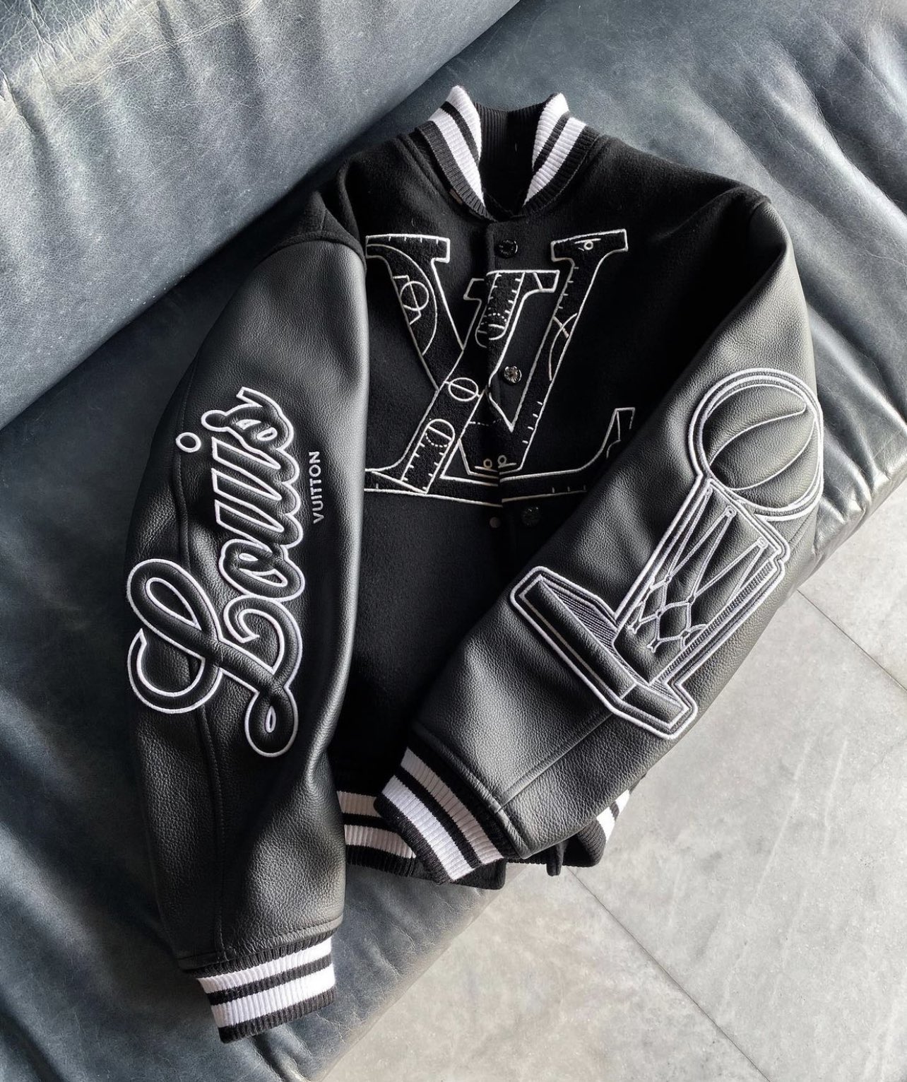 REVOLT on X: An LV varsity jacket has officially been added to