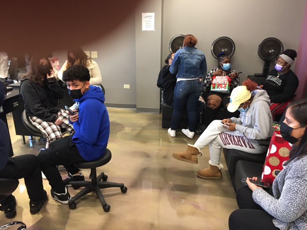 JohnRobinzine's tweet photo. Cosmetology/Barbering students celebrating the holiday season with their very own Secret Santa.  #wearefamily https://t.co/hAVijevosO
