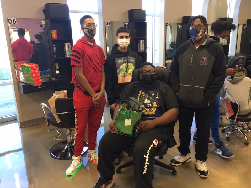JohnRobinzine's tweet photo. Cosmetology/Barbering students celebrating the holiday season with their very own Secret Santa.  #wearefamily https://t.co/hAVijevosO