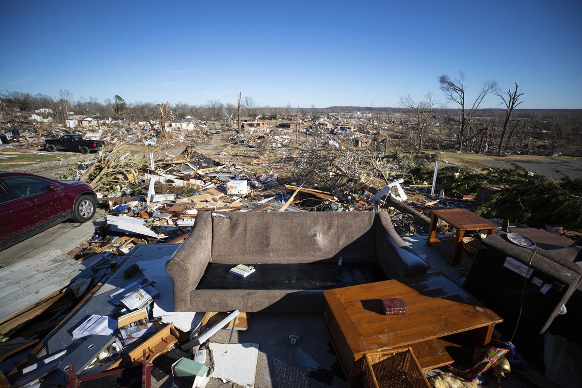 Deaths from a wave of tornadoes are likely to pass 100 in Kentucky alone, says the governor, with over 1,000 homes 'gone, just gone.' Confirmed deaths in Kentucky and 5 other states are at least 94, including workers who were trapped in a candle factory and Amazon warehouse.