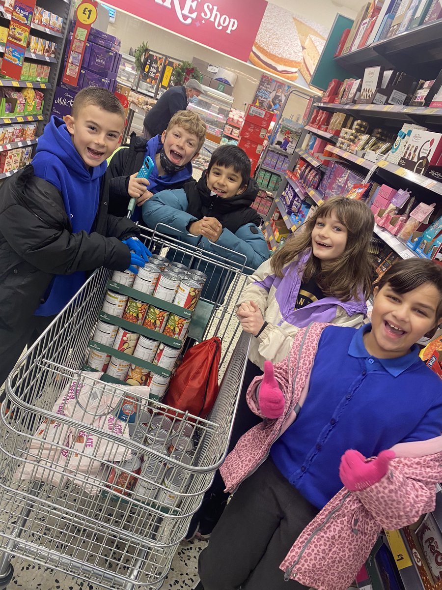 CoedGlas2023's tweet photo. Year 5 working together to buy items to donate to Cardiff Food Bank #CoedglasRRS @Morrisons https://t.co/kI0KQSPqGU