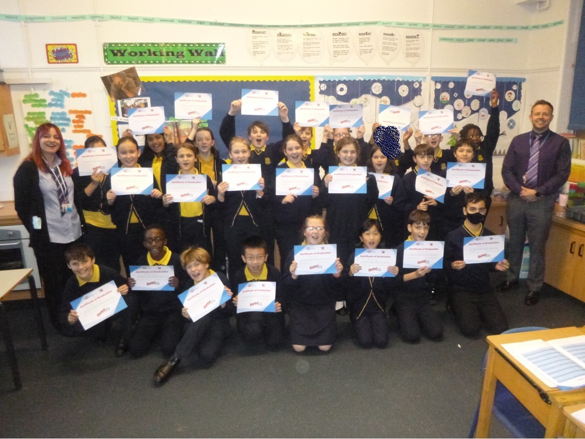 The final Year 6 class proudly showing their Dare 25 certificates as well. #lifeskills