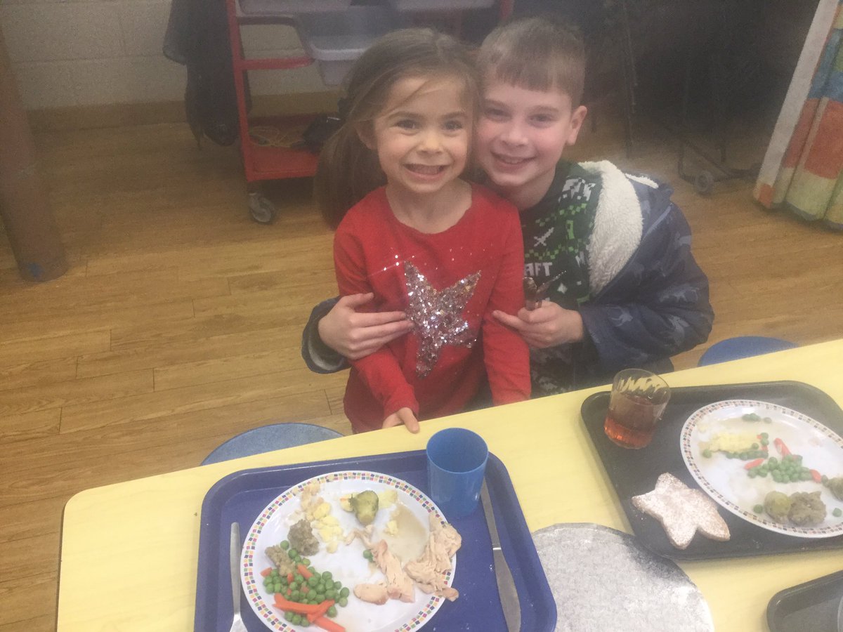 EYFS and Year 5 Buddies Christmas Dinner Day