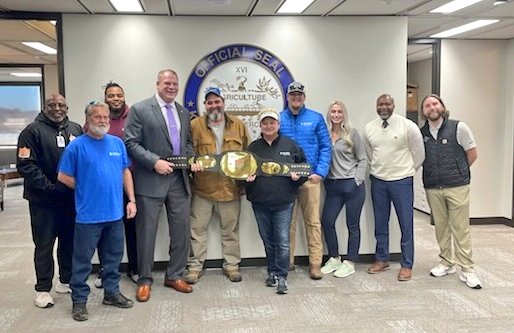 GlennJacobsTN's tweet photo. The Karns Sportpark wins the title as @USASoftball of Tennessee's "Complex of the Year for 2020!" So proud of @knoxcountyparks for all their hard work! And they even let me wear the championship belt! https://t.co/RWi1nwRDWq