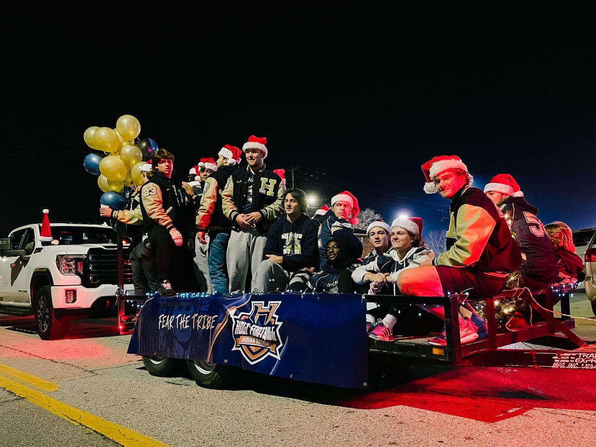 WSDinfo's tweet photo. The WSD Transportation Team and District leadership took part in the annual Wentzville Holiday Parade. Holt Football, Cheer, and Band also joined to celebrate their historic football season. #WeAreWentzville #WSDcommunity https://t.co/less6gSEpC
