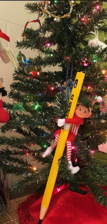TeachersChatter's tweet photo. Our Elf, Candy Candy's shenanigans! @TCSPublic #elfontheshelf2021 #elfshenanigans #theteacherschatterbox https://t.co/6lYNwR17Pq