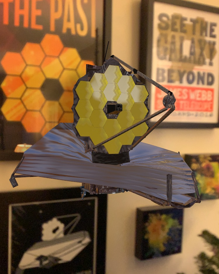 James Webb Space Telescope 3D model placed in front of wall of Webb-related art