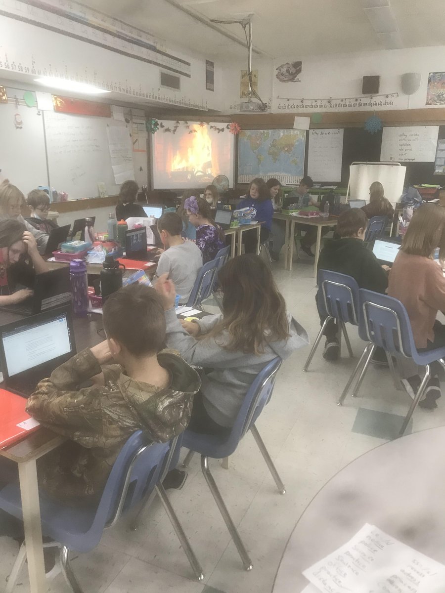 The Grade 5/6 annual writing under the 'fireplace.' The countdown for Christmas Break has begun. #4moredays #Christmas #fireplace #phdr7 #busby #ChristmasFireplace #essays