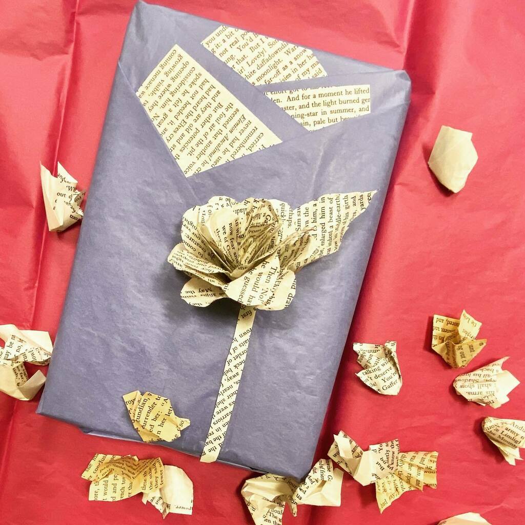 GDRHSlibrary's tweet photo. Wrapped my book for our Book Club’s yankee swap tomorrow during WIN.  If you want to join the fun, ask me for details. https://t.co/q7q6lReSns
