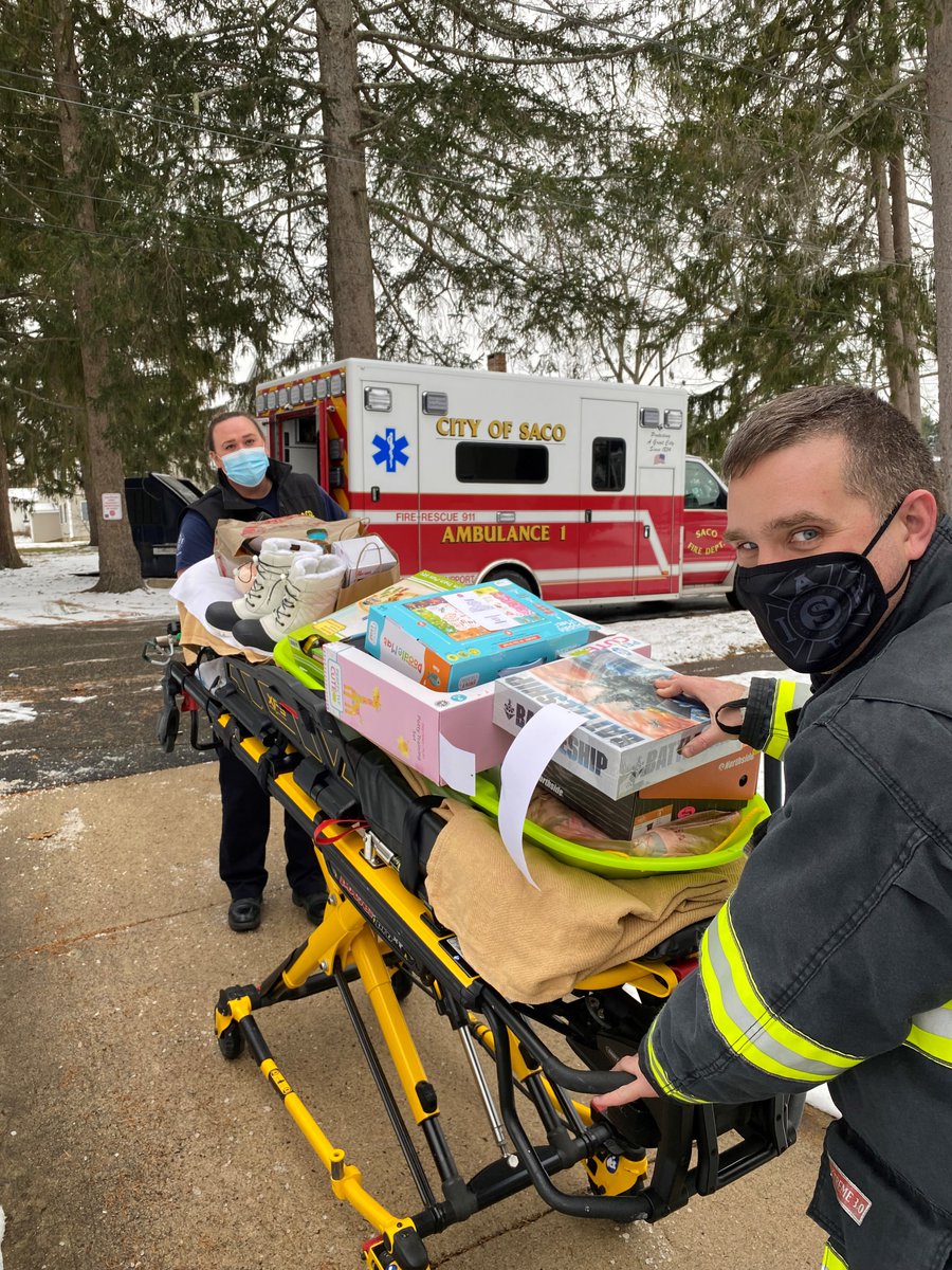SacoFireDept's tweet photo. Working with our community Salvation Army, our Firefighters/EMTs are spreading some holiday cheer by filling the ambulance with gifts for local children in need. https://t.co/wKHqaIeDK4