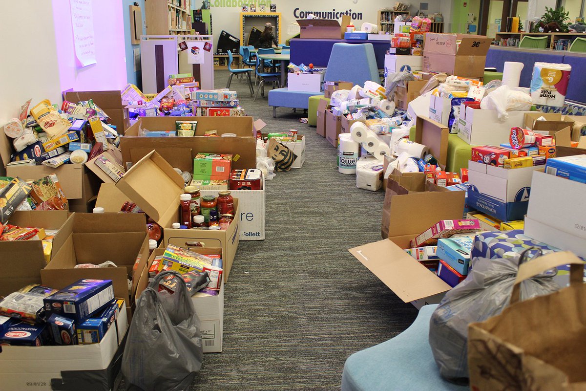 CCSD93's tweet photo. Heritage Lakes students &amp; staff are helping to make the season brighter for local families in need by donating food and other essentials to the Humanitarian Service Project (HSP). Students worked last week to box &amp; stack the impressive array of donations for pickup this week! https://t.co/i3l8QaVVBc