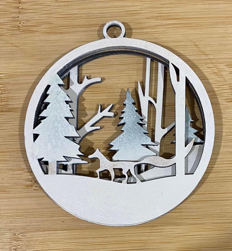 TechnologySab's tweet image. Miss Gaspsparotto using a laser cutter to make beautiful Christmas ornaments.