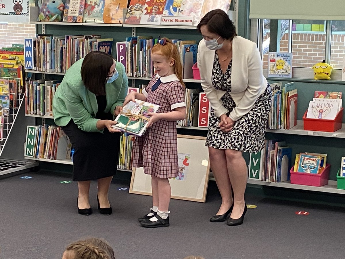 kathybrowne62's tweet photo. Very honoured to have the Minister for Education @smitchellmlc visit our school today to present The Minister’s Christmas Card winner with their  framed artwork. Hayley, our lucky and talented kindergarten student was very excited to receive her prize. @k_rigas @TanyaDaviesMP https://t.co/fHr6599lxW