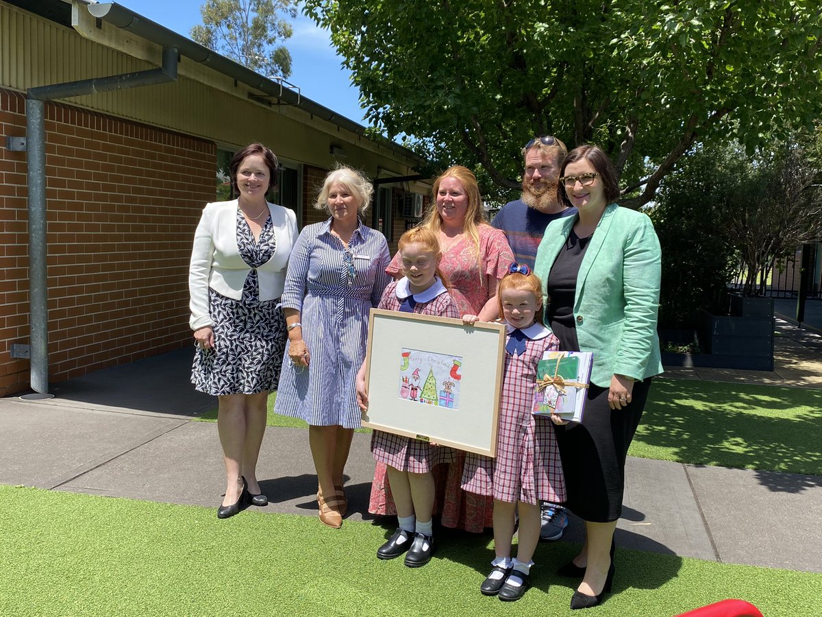 kathybrowne62's tweet photo. Very honoured to have the Minister for Education @smitchellmlc visit our school today to present The Minister’s Christmas Card winner with their  framed artwork. Hayley, our lucky and talented kindergarten student was very excited to receive her prize. @k_rigas @TanyaDaviesMP https://t.co/fHr6599lxW
