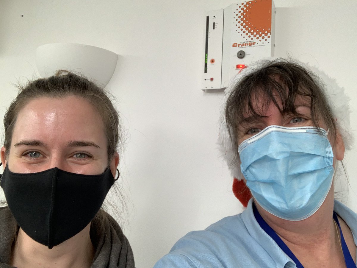 ross4131's tweet photo. Lovely to be able to vaccinate one of my team today! #GetBoosted - can’t see my festive Christmas hat though! https://t.co/cynIzQU3Vs