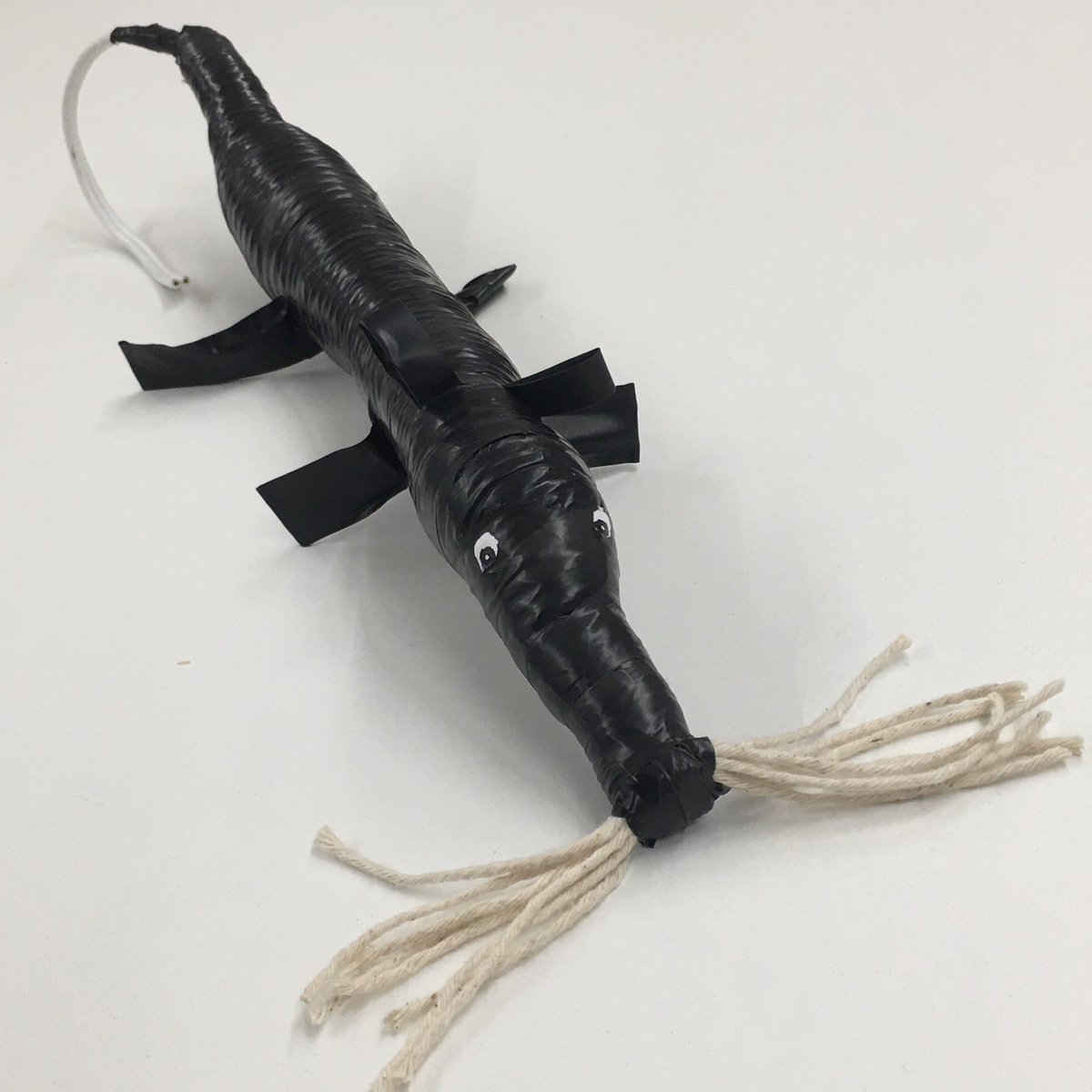 LeysMoultonCamb's tweet photo. Old ski sock, electrical tape, Tippex and string … result: a “new” and improved Sammy Whiskers for this afternoon’s traditional #SplatTheRat game! #DIY #MakeDoAndMend https://t.co/WTTUI0N5GC
