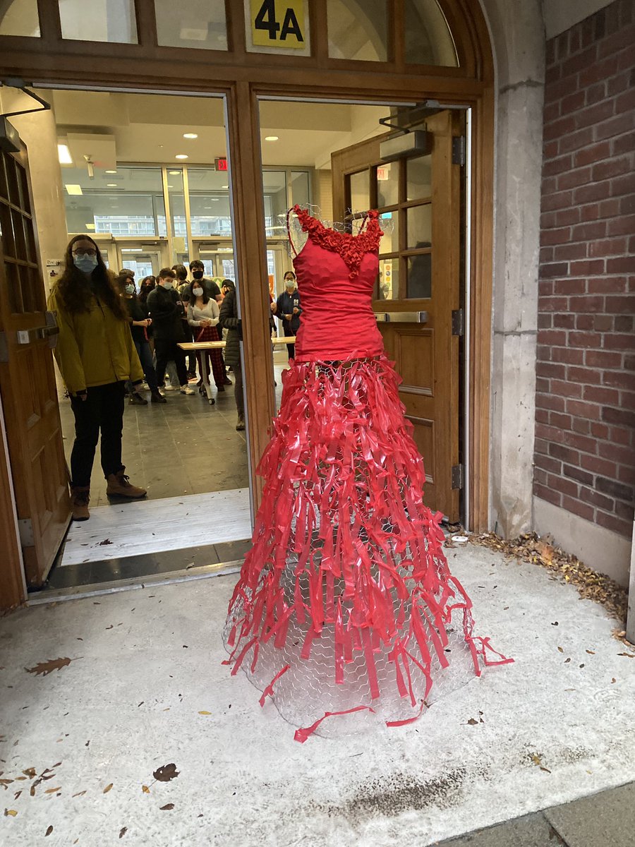 trish_boon's tweet photo. On Dec 6 we unveiled our armature which was made by the art council, top was made by the fashion club. Each NTCI student tied one red ribbon to her skirt to honour the MMIW. https://t.co/mAG1nY8rzD