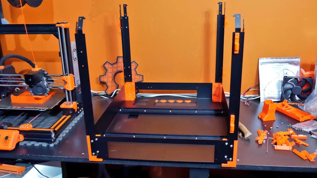 de3dprintman's tweet photo. The assembly of the #PrusaBox enclosure is a lot of fun so far and everything fits together nicely. I love how the black metal parts look with the printed parts in @prusament PETG Prusa Orange. It's amazing how strong the assembly is.
#3dprinting #3dp #printerbox #prusa3d https://t.co/VJvoO615Jo