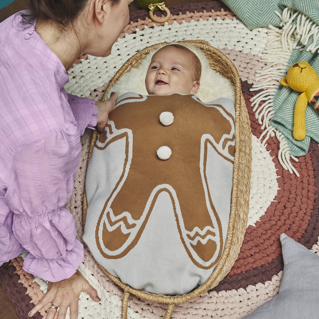Bundle the littlest elves up in some Christmassy cosiness with this gingerbread blanket from Studio Hop. Shop now: bit.ly/3DQDoJj #Christmas2021
