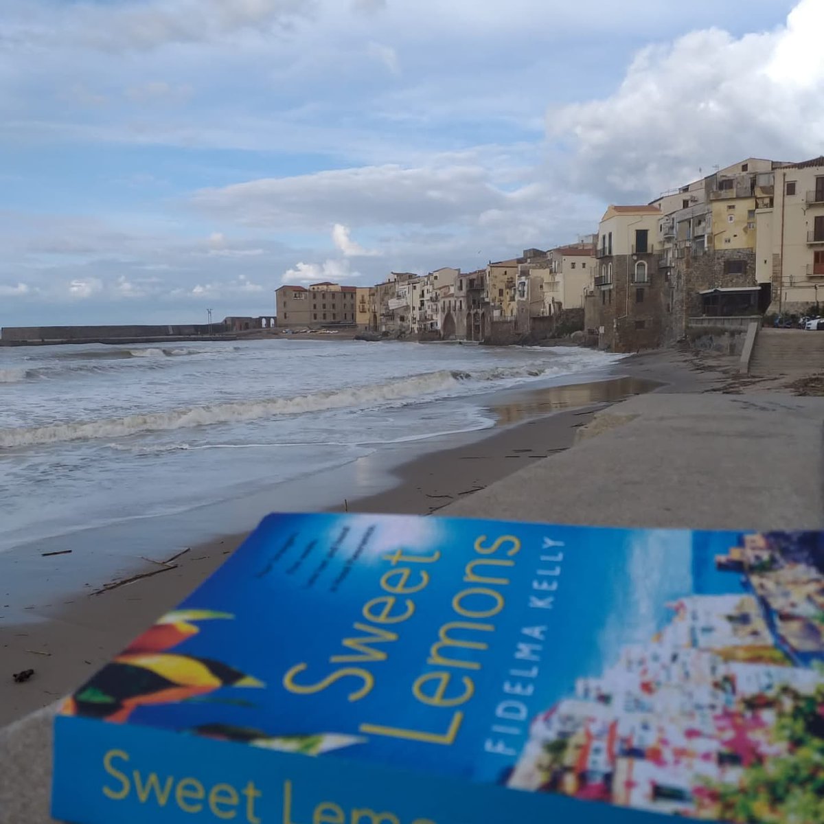 fidelmawrites's tweet photo. #SweetLemons spotted on location in Cefalù, Sicily, with a well-wrapped up reader! @PoolbegBooks, #sicily, #irishfiction. Available on: https://t.co/EtzfgpHAKU. https://t.co/vSJoPZ0c0H