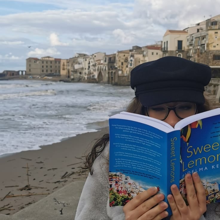 fidelmawrites's tweet photo. #SweetLemons spotted on location in Cefalù, Sicily, with a well-wrapped up reader! @PoolbegBooks, #sicily, #irishfiction. Available on: https://t.co/EtzfgpHAKU. https://t.co/vSJoPZ0c0H