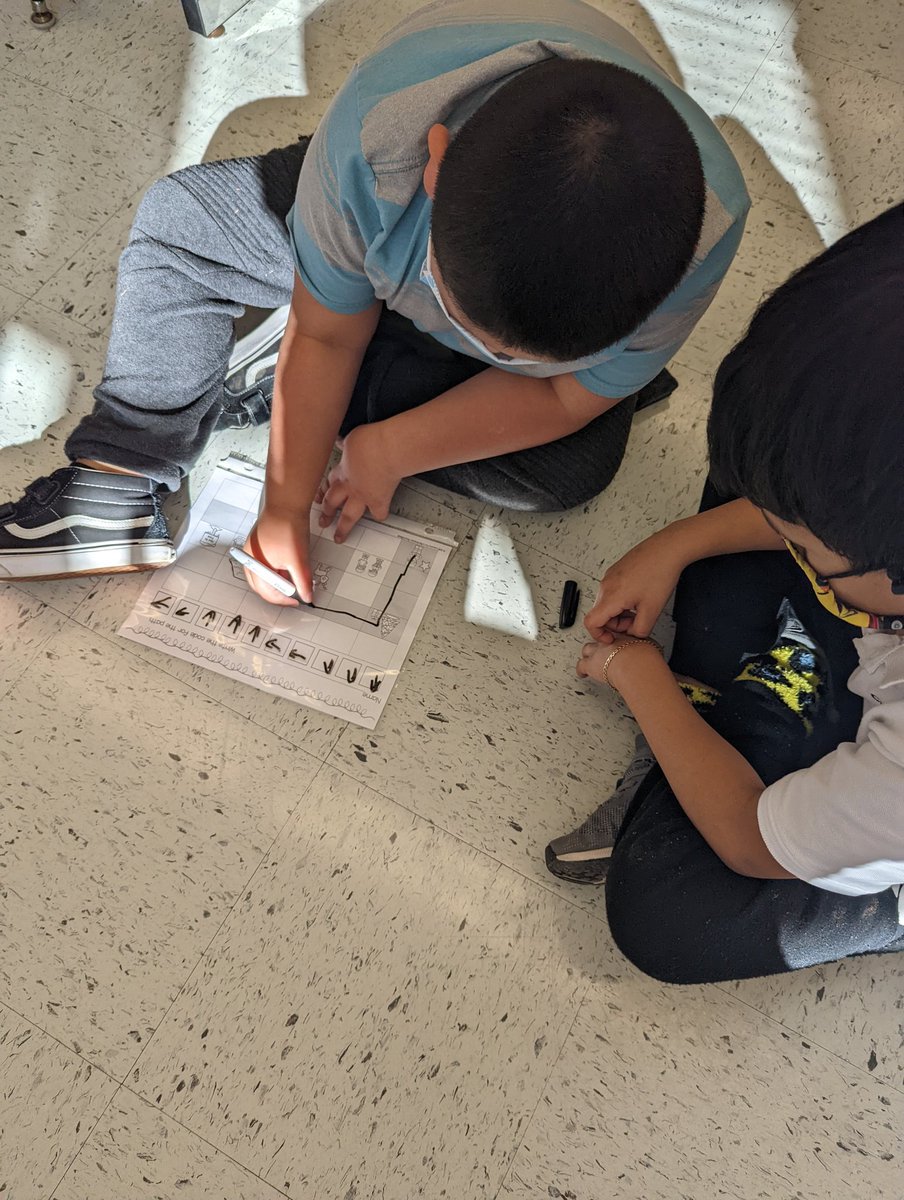 Learning about coding with an "unplugged" activity. One partner had to write the code and the other had to follow the directions to see if their partner kept them on the right path. #hourofcode <a href="/SullyES_LCPS/">Sully ES</a>