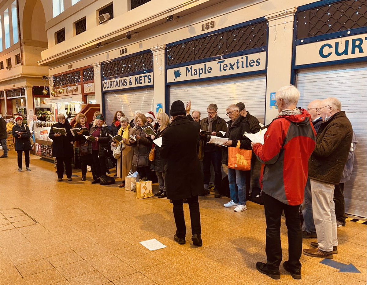 tcfcharity's tweet photo. Shoppers at the Historic #GraingerMarket were in for a real treat today. Members of the fabulous #BachChoir joined us to sing some classic Christmas Carols and they were in fine form! Head over to our Facebook page to see them performing. #christmas https://t.co/he13moIHc2