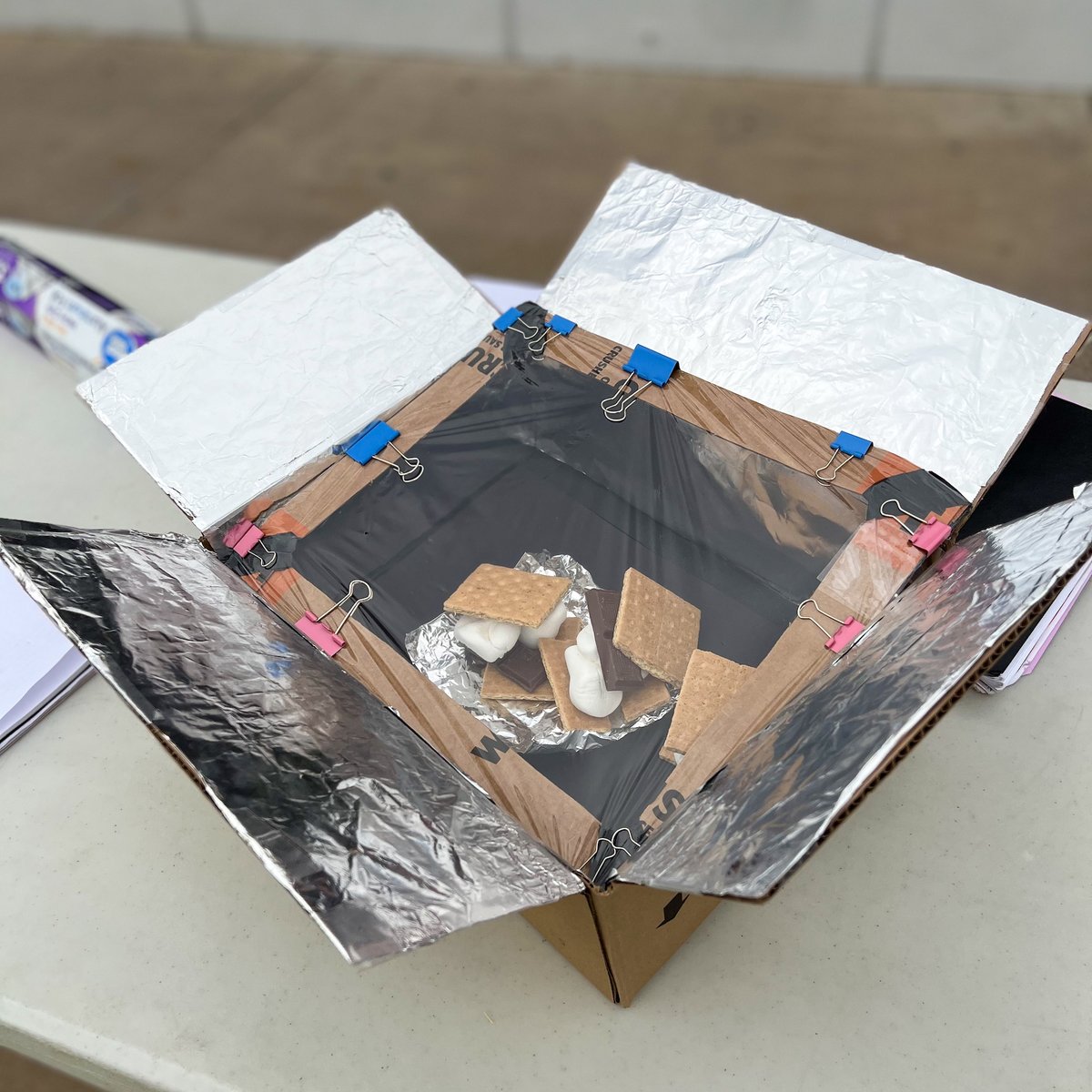 gatewayaz's tweet photo. Cloudy with a chance of...s'mores!?
Today, our GWECHS students are hosting a solar oven competition. Even with the overcast skies, the ovens can reach a temperature of 120Β° π₯
#Education #STEM #GateWayCC https://t.co/t1luQEmEkU