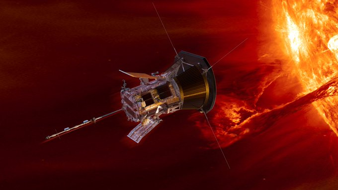 parker solar probe spacecraft infront of bright red background with edge off the sun to the right.